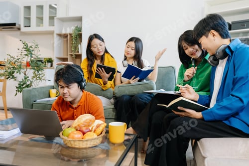 Preview: Asian college student reading a book study