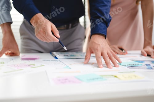 Preview: Serious diverse business team leader discuss financial paperwork, Smart businessman