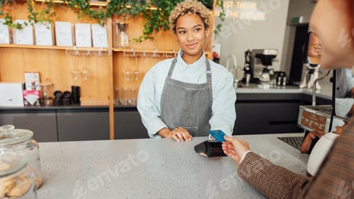 Preview: Woman bartender receives payment from a customer
