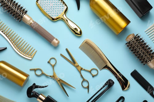 Preview: Different hair styling tools on light blue background, flat lay