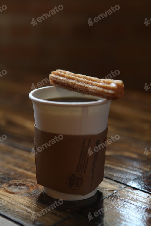 Preview: Churro and Coffee on Wood Table