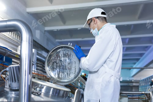 Preview: man in a white robe and mask stands near an open can in the shop