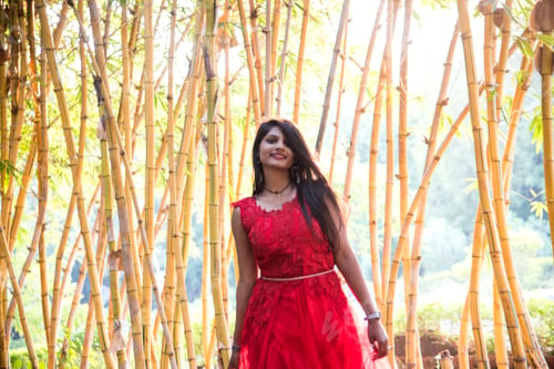 Preview: Happy smiling girl in bamboo forest, Girl red dress walking on bamboo Forest.
