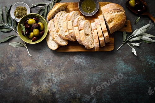 Preview: Ciabatta bread sliced on a board, background, copy space, top view