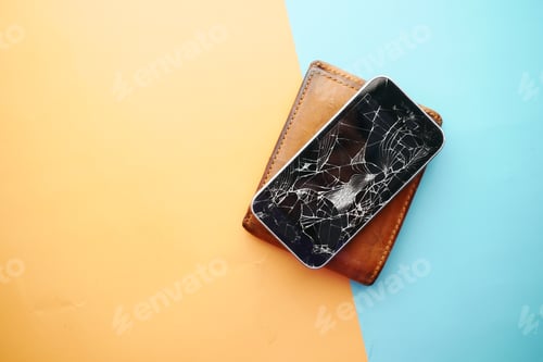 Preview: Top view of broken smart phone on color background