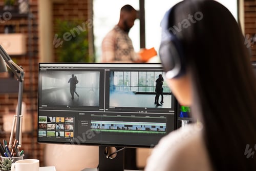 Preview: Female Filmmaker With Headphones Editing Dance Video