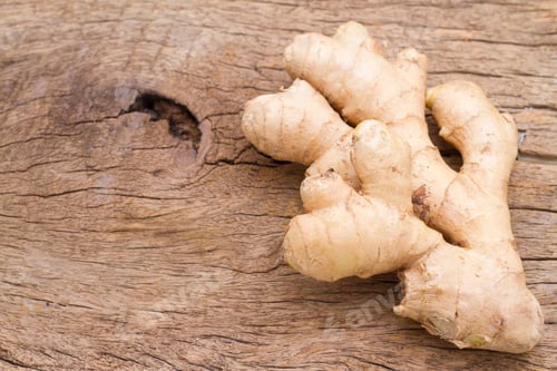 Preview: ginger roots on the table, top view