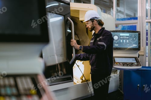 Preview: Professional technician checking and repairing part of automatic machine