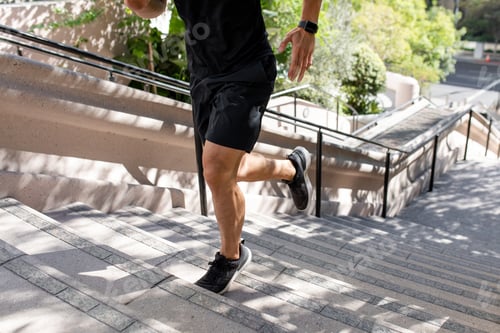 Preview: Asian man running up the steep stairs