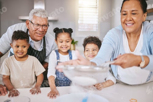 Preview: Learning family secrets. Shot of a mature couple baking with their grandkids at home.