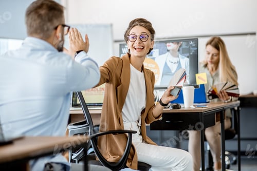Preview: Web designers working in the office