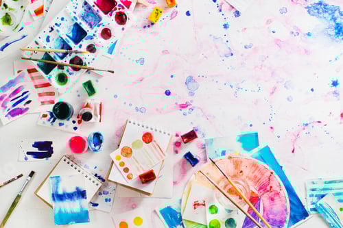 Preview: Feminine artist workplace with watercolor palettes and color circle