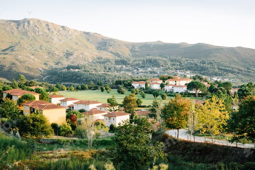 Preview: Small rural village near a mountain