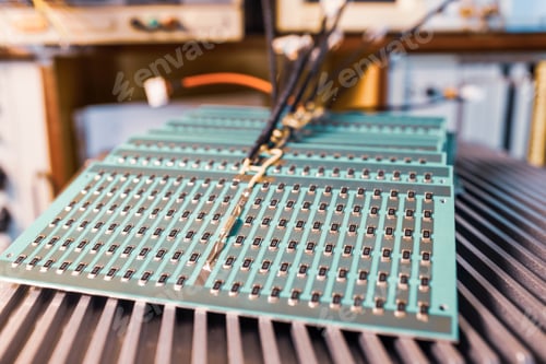 Preview: Close-up side view of a panel of SMD resistors