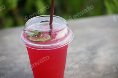 Preview: Refreshing Red Drink with Lime and Rosemary