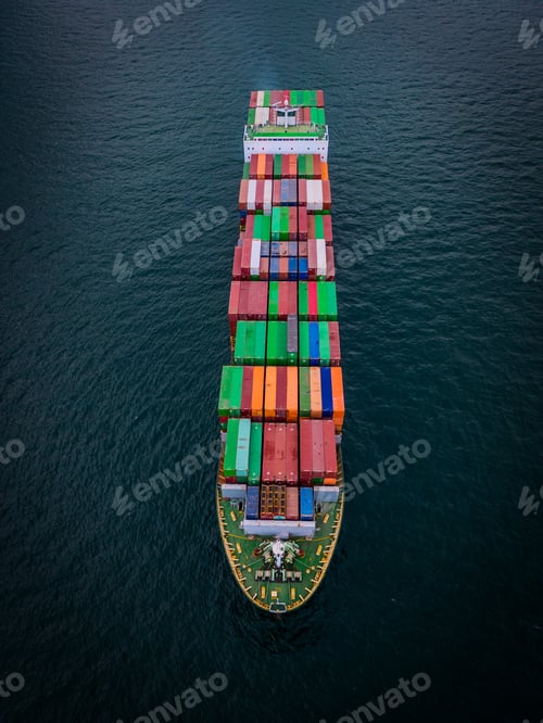 Preview: A loaded container ship in the sea, aerial view, concept of international trade and shipping