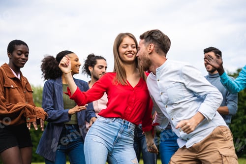 Preview: Happy people having fun dancing on the park during music festival