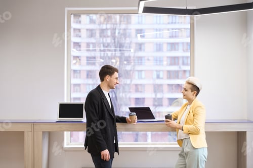 Preview: Coworking partners are talking on coffee break