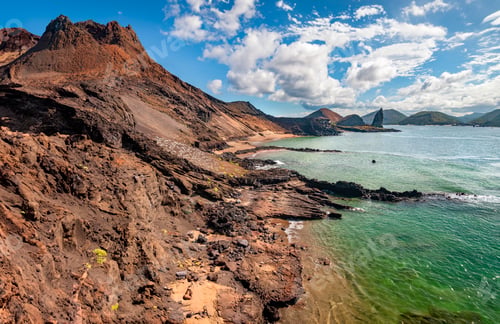 Preview: Pinnacle Rock and the volcanic landscape of Bartolome Island in the Galapagos Islands - Ecuador