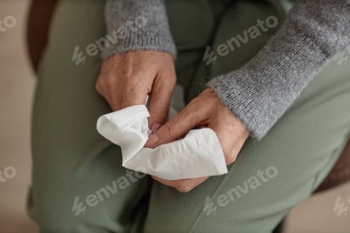 Preview: Top View Senior Woman Holding Tissue and Crying
