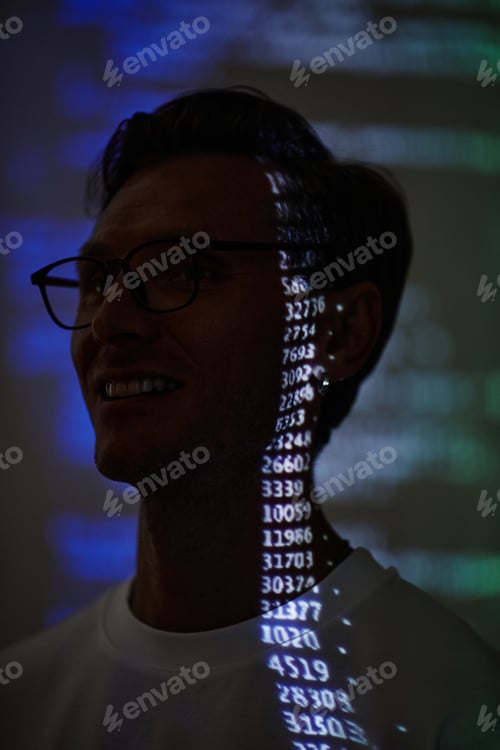 Preview: IT worker with computer code