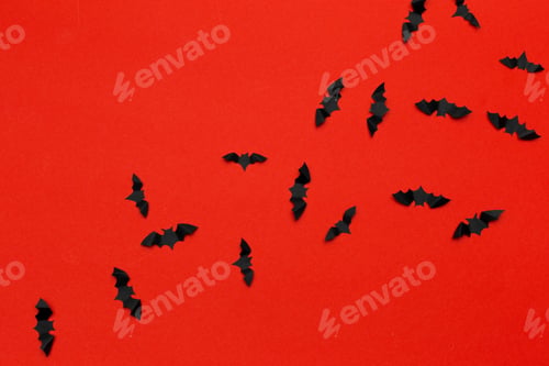 Preview: halloween and decoration concept - paper bats flying
