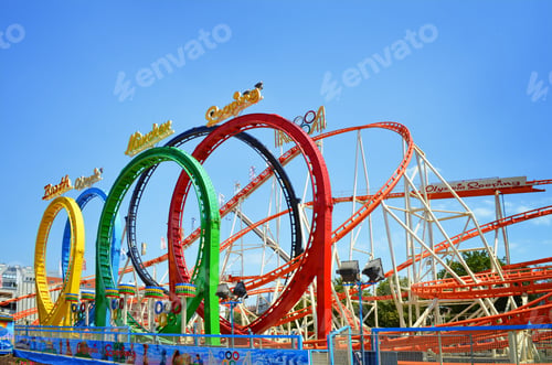 Preview: VIENNA, AUSTRIA - JUNE 18, 2018: Olympia Looping roller coaster in amusement park on sunny day