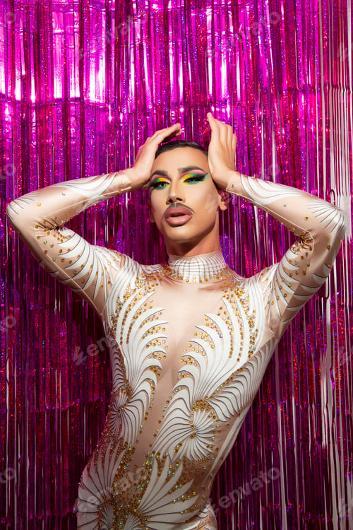Preview: young man makeup drag queen performer with colorful background