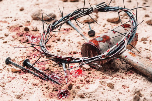 Preview: Crown of thorns, hammer, bloody nails on ground. Good Friday, Passion of Jesus Christ. Christian