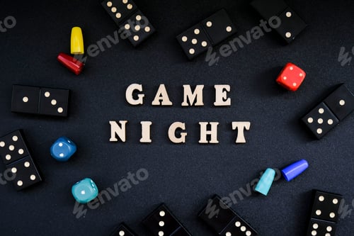 Preview: Text GAME NIGHT spelled out in wooden letter. Surrounded by dice, dominoes other game pieces