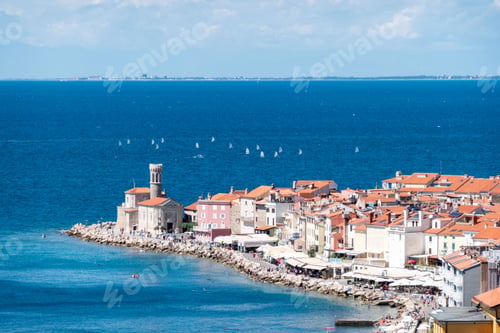 Preview: Beautiful shot of aged residential buildings of Piran onshore in Slovenia