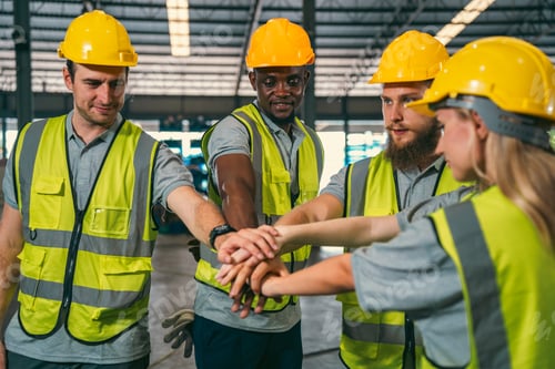 Preview: factory setting, team of engineers and foremen emphasize safety and teamwork meeting