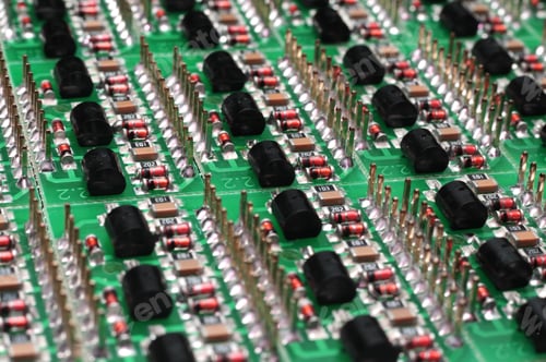 Preview: Close-up side view of a PCB board with SMD components