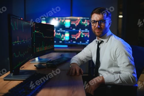 Preview: Financial Analyst. Businessman Works in Investment Bank Downtown Office at Night
