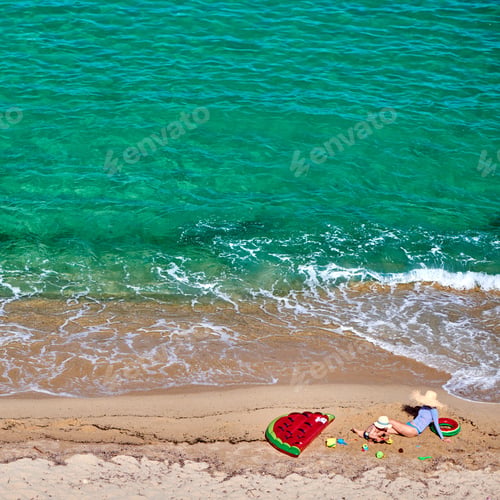 Preview: Two Year Old Toddler Boy And His Mother On Beach With Inflatable Float And Ring. Summer Family