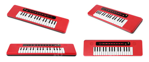 Preview: Toy electric piano on white background, collage. Child's musical instrument