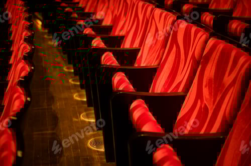 Preview: Closeup of empty red colored seats in a movie theatre with no person