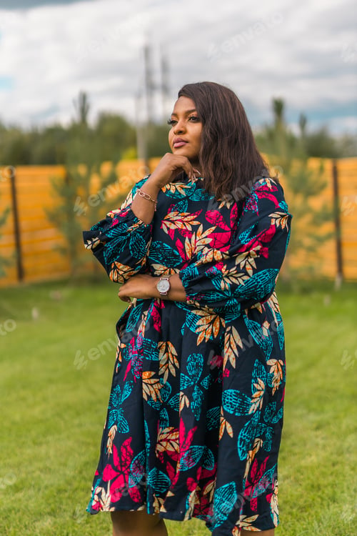 Preview: Portrait of beautiful african american woman having fun on village or suburbian. Outdoor portrait of