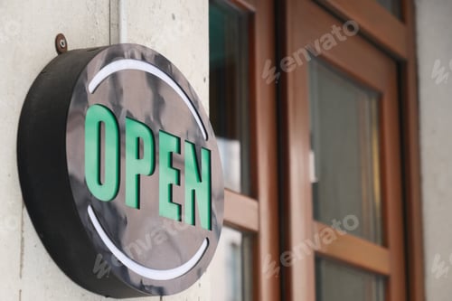 Preview: An Illuminated Open Sign is hanging prominently at the entrance of the store, welcoming customers