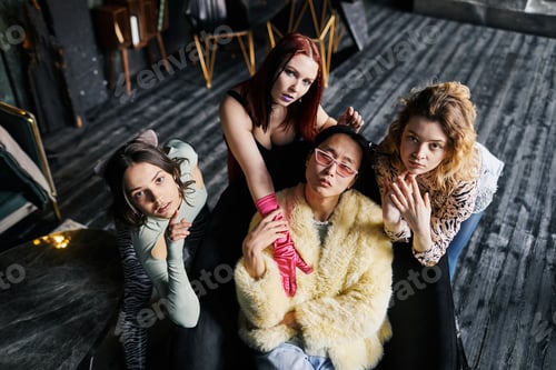 Preview: Four Individuals Strike a Pose in Room