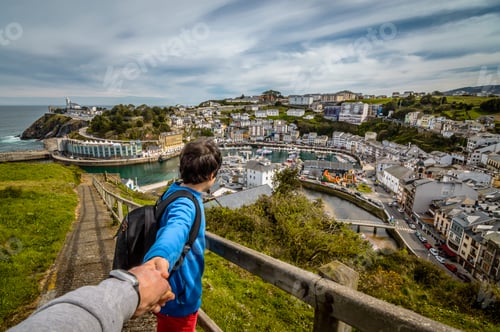 Preview: Follow me to the sea. Son and father walking together to a beautiful seascape