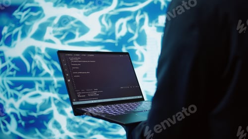 Preview: Close up of worker using AI deep learning and laptop to look at data