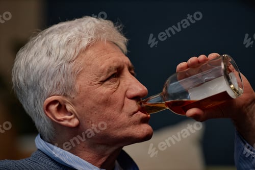 Preview: Elderly Man Drinking Liquid from Beverage Glass