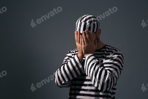 Preview: Prisoner in special uniform on dark grey background, space for text