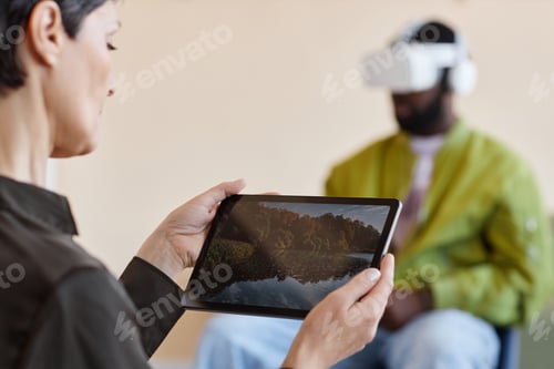 Preview: Psychologist using tablet pc at her work