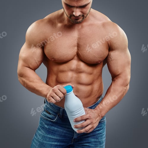 Preview: Muscular man with protein drink