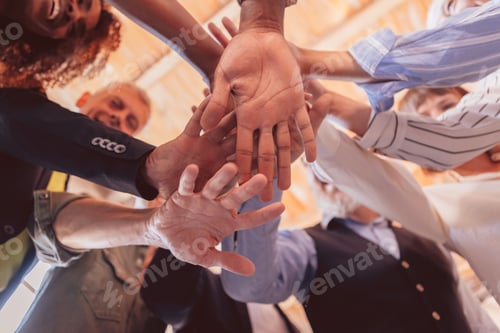 Preview: teamwork stacking hands - Unity in Diversity