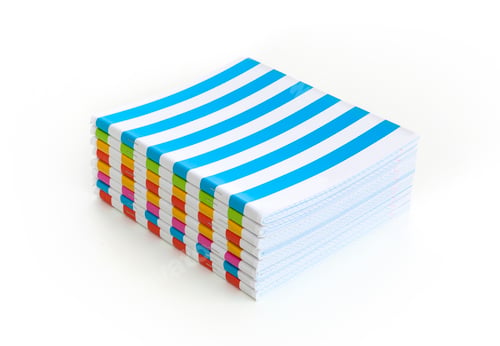 Preview: Stack of Color notebook isolated on white background