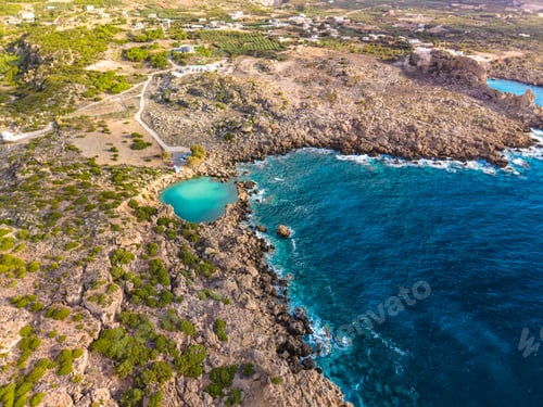 Preview: Aerial view of of a small sea crater surrounded by rocks, Voulolimni, Crete