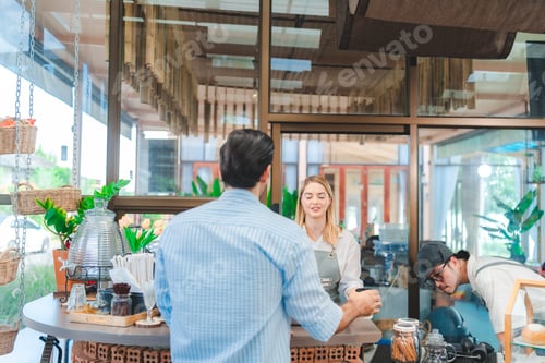 Preview: Smiling waitress wear apron take order talk to clients serving restaurant guests choosing food menu